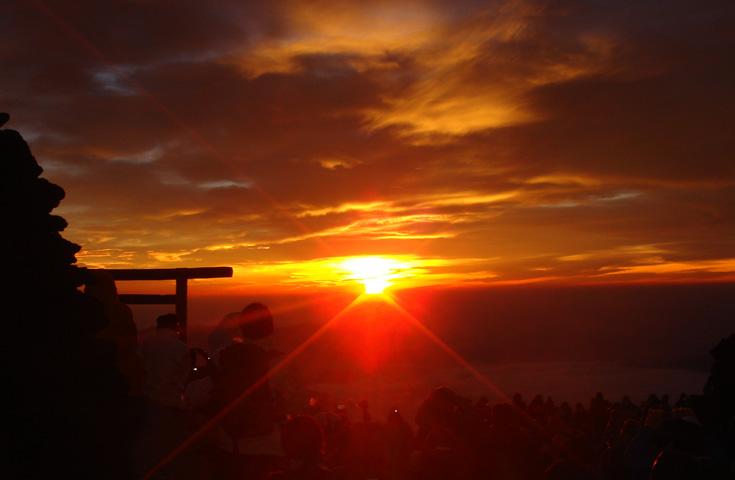 We are impressed by view of the sunrise from the top of a high mountain from top!